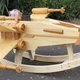 Illustration for article titled This Exquisite Wooden X-wing Rocker Will Make You Miss Being a Kid